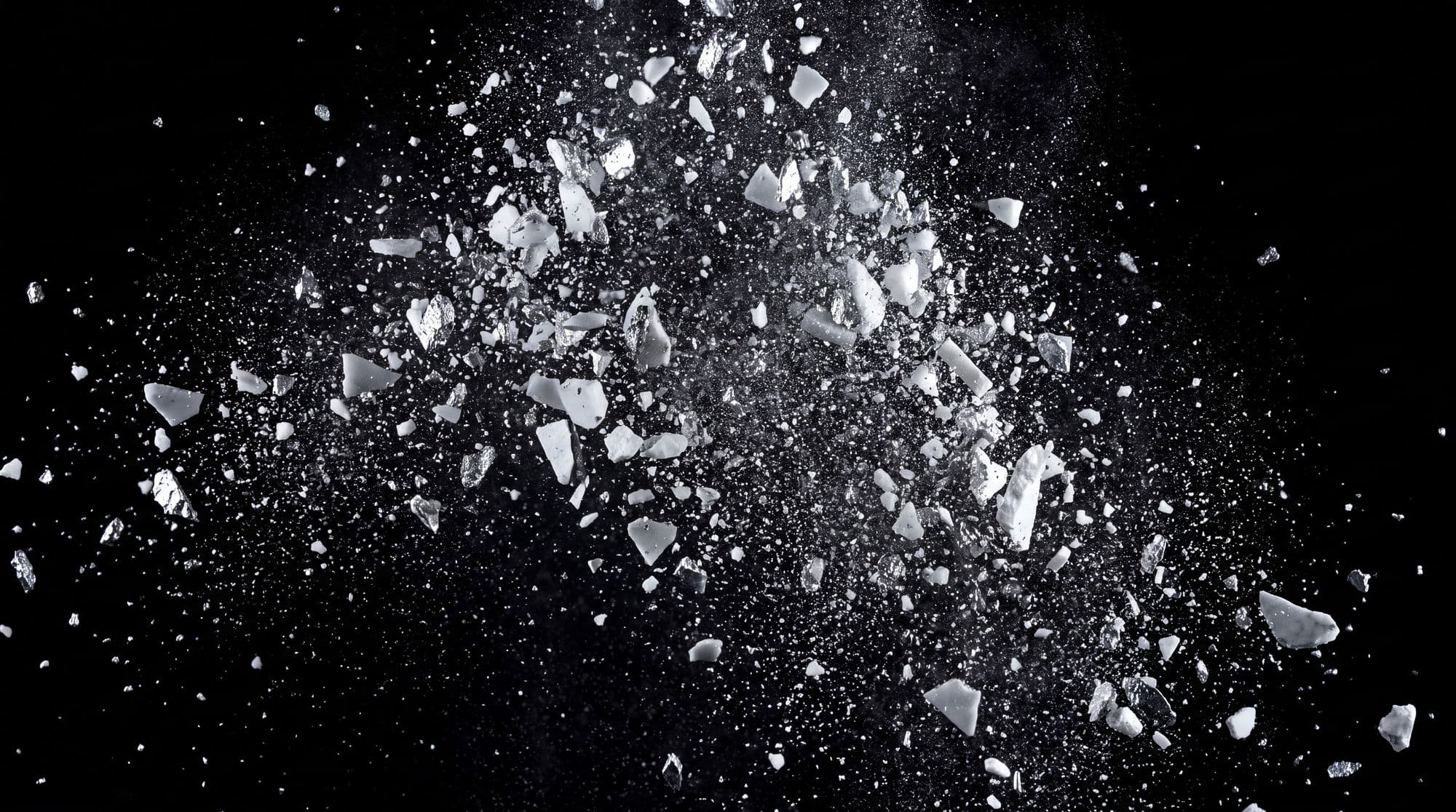 White marble shattering into fragments